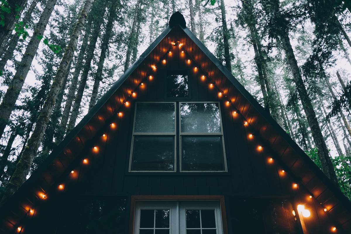 lights house with string lights trees